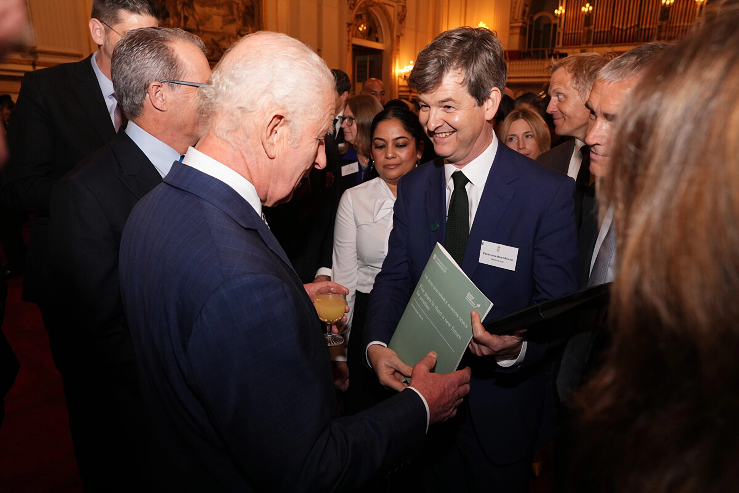 Prof Rob Miller presenting the report to HRH King Charles III